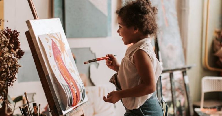 Canvas Painting - A Young Girl Looking at Her Artwork
