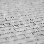 Writing Poetry - Black Text on Gray Background