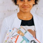 Learning Books - Woman Carrying Children's Learning Books