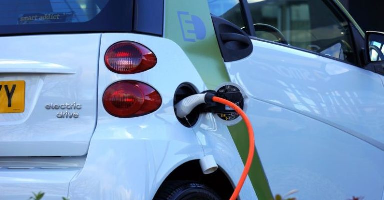 Electric Cars - White and Orange Gasoline Nozzle