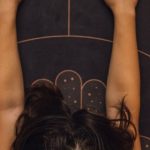 Pilates Exercise - Overhead Shot of a Woman Meditating