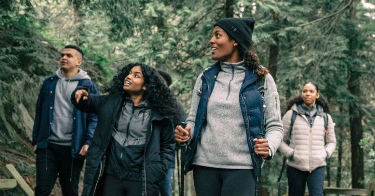 Hiking Gear - People Hiking in a Forest