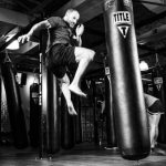 Martial Arts - Man Kicking Heavy Bag