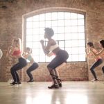 Zumba Dancing - Group of Women Doing Exercise Inside The Building