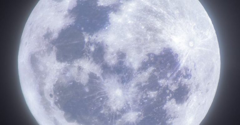 Nanotechnology Science - A full moon is shown in the dark sky