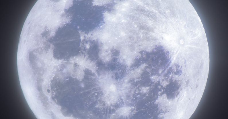 Nanotechnology Science - A full moon is shown in the dark sky