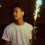 Teen Rebellion - Man in White Crew Neck T-shirt Holding Fire