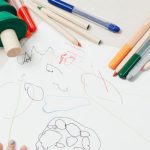 Child Drawing - Kid On White Table Painting