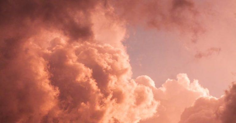 Dream Interpretation - Wonderful pink clouds in sky at sunset