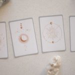 Astrology Horoscope - Top View of Tarot Cards and Crystals