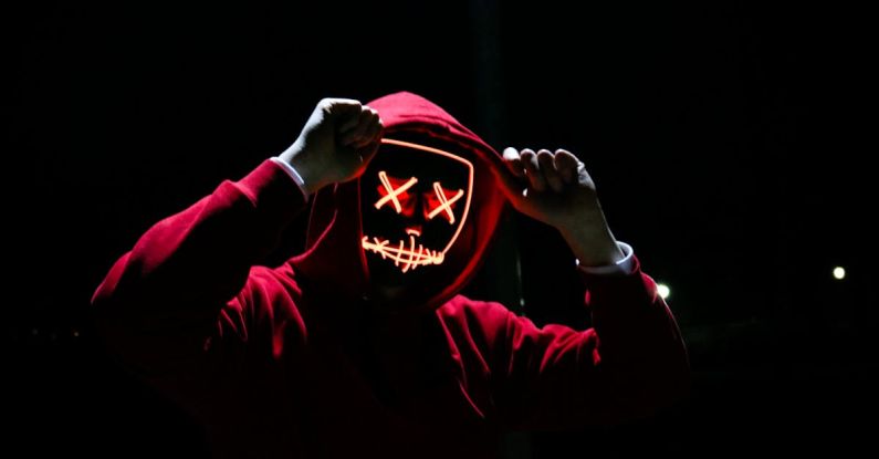 Dark Web - Person Wearing Red Hoodie