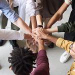 Diversity Workplace - Photo Of People Holding Each Other's Hands