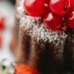 Chocolate Lava Cake - Red currant on delicious lava cake with berries