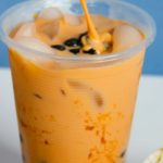 Homemade Ice Cream - Clear Plastic Cup With Brown Liquid and Ice